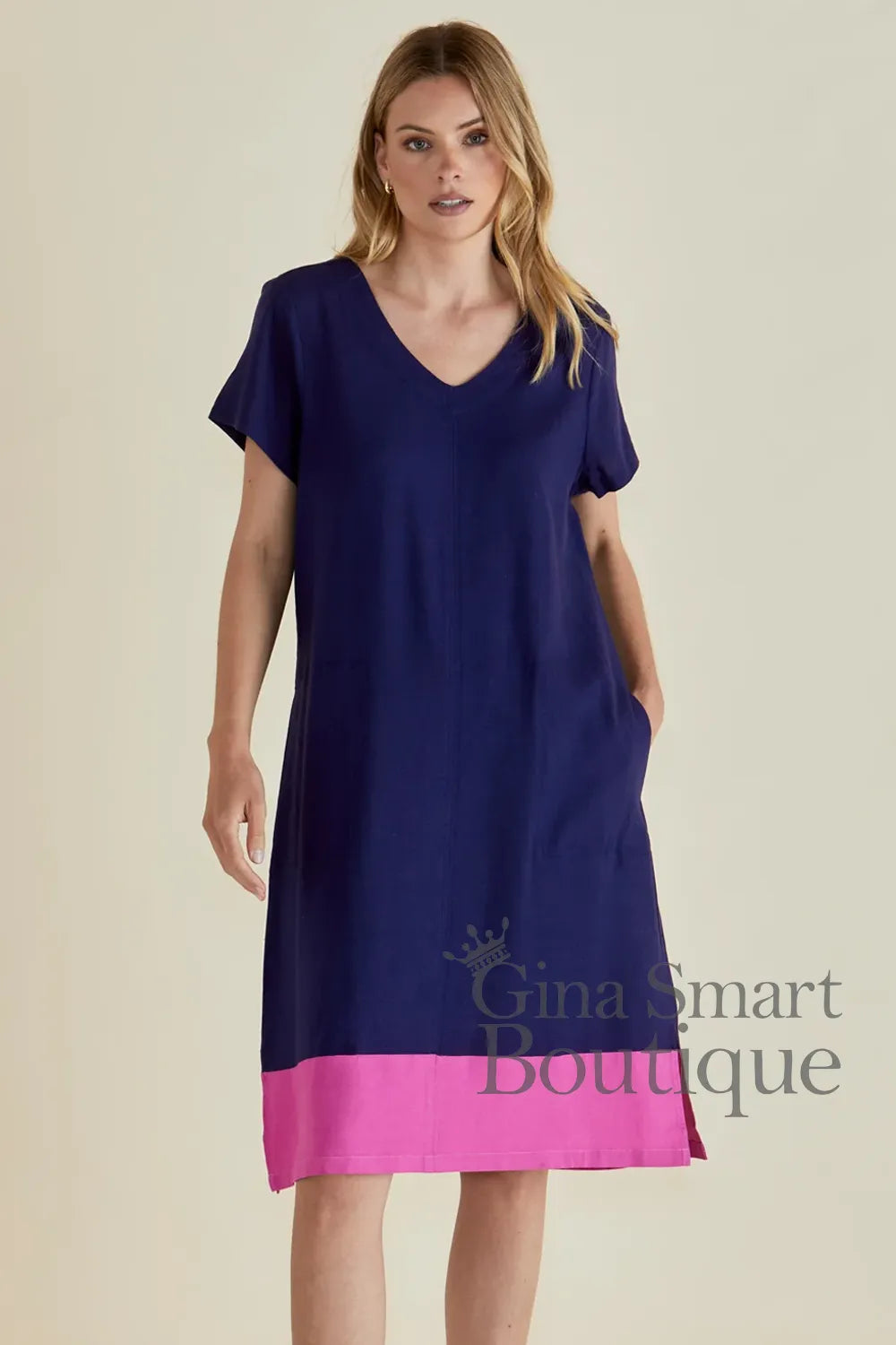 Betty Basics short sleeve navy blue V-neck midi dress with a pink colour block hem - available at Gina Smart Boutique