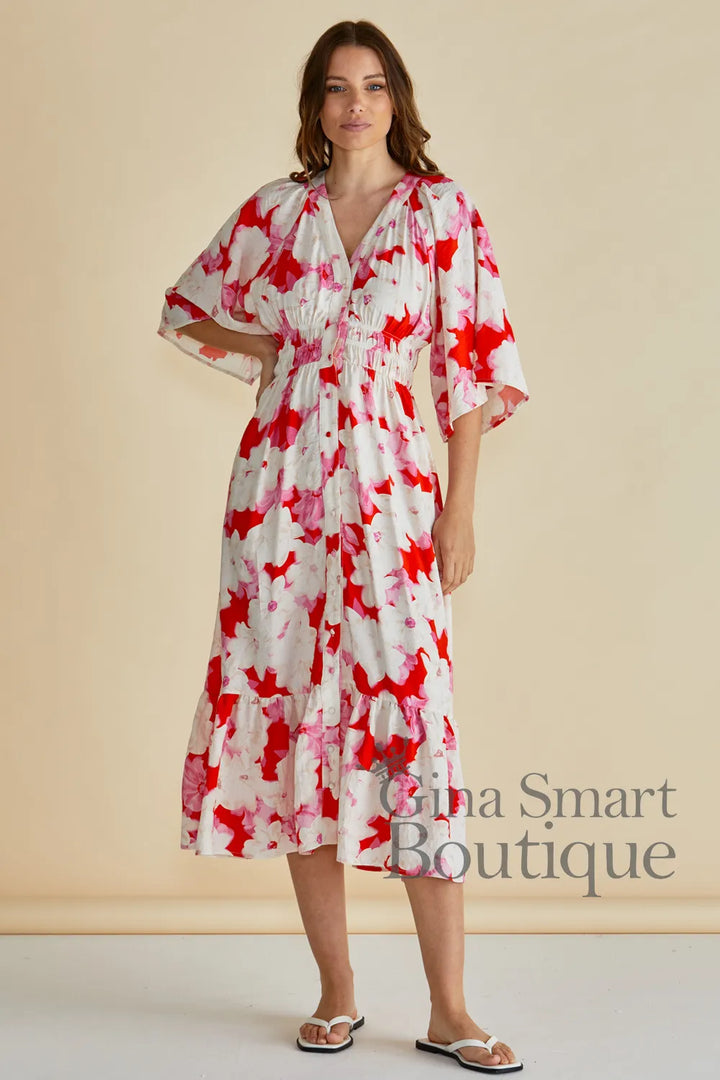 Betty Basics Moxie Dress red a pink abstract floral midi dress with flutter sleeves and smoked waist - available at Gina Smart Boutique