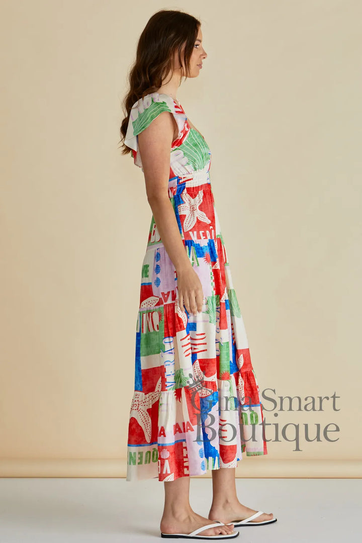 Betty Basics Sea Sadie Dress side view multi coloured midi dress with starfish graphics and flutter sleeves available from Gina Smart Boutique