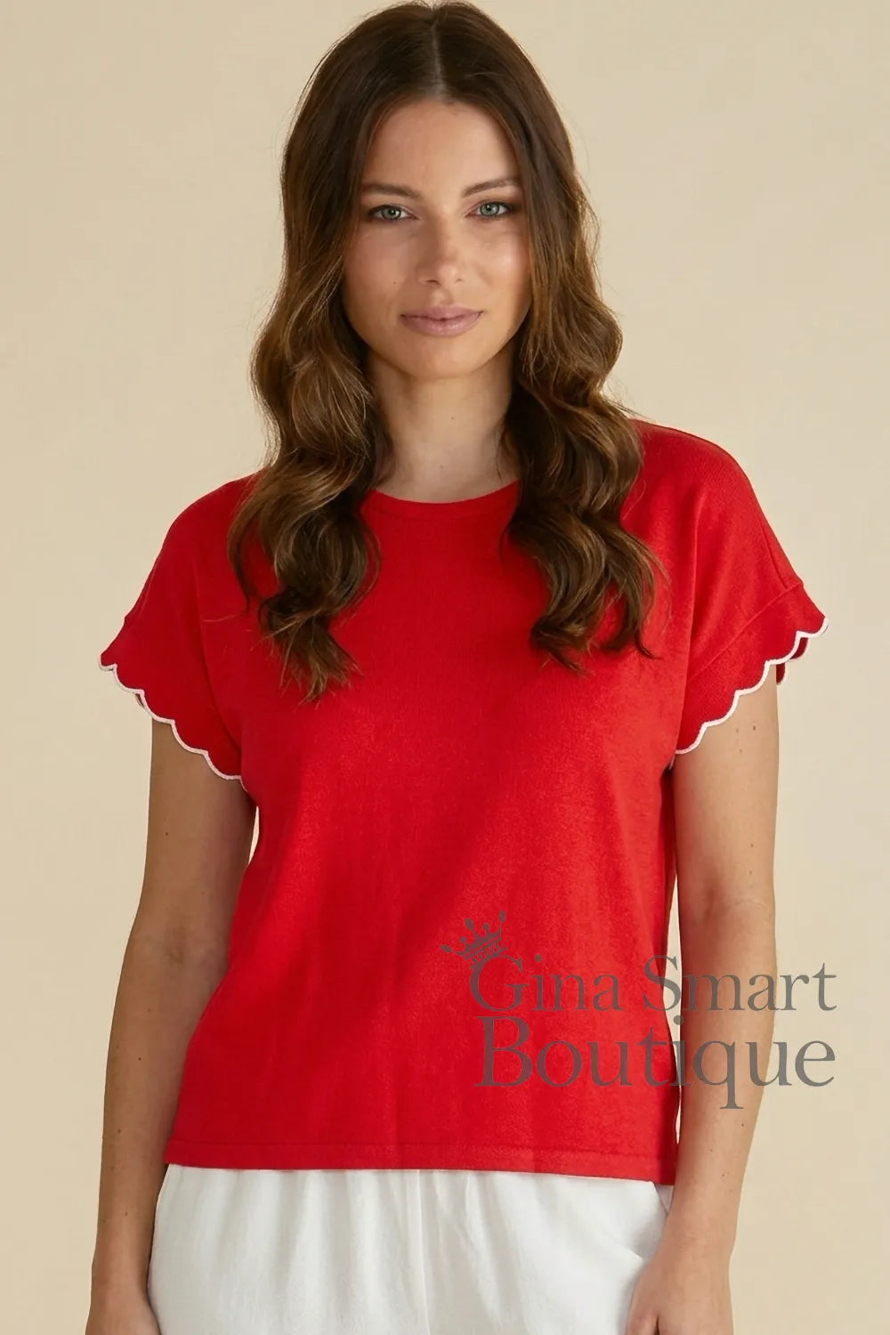 Betty Basics Sloane Red Scallop Tee is a vibrant red v-neck top with white scalloped trim.  Available at Gina Smart Boutique.