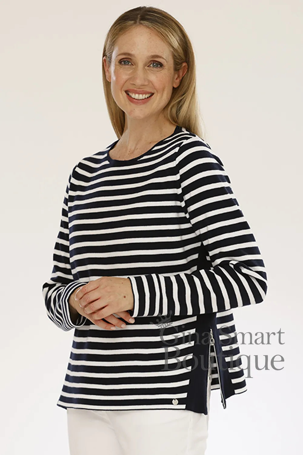 Gollehaug Navy and White horizontally striped long-sleeve pullover featuring unique side vent detailing.  Available at Gina Smart Boutique.