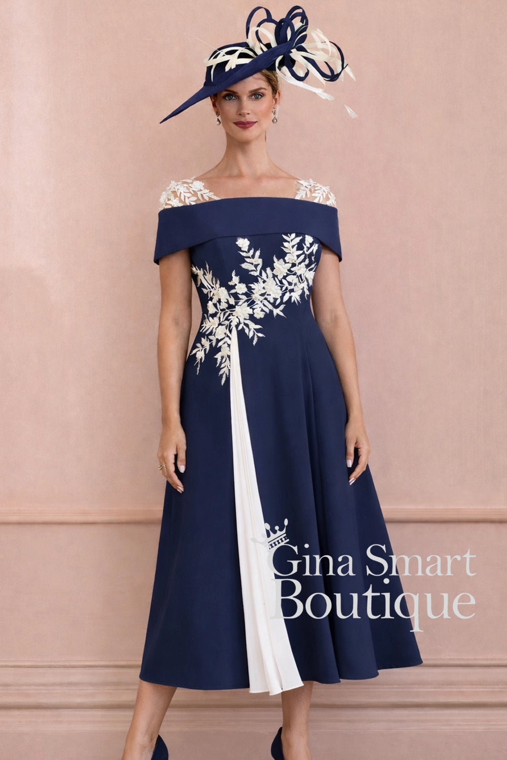 John Charles navy and ivory dress with lace illusion neckline, floral embroidery, and pleated skirt insert – classic Mother of the Bride outfit.