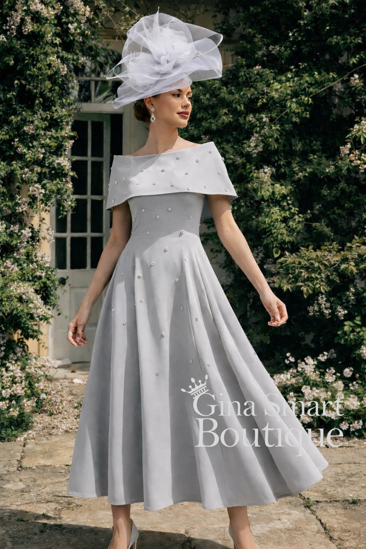 Veni Infantino silver pearl beaded dress with matching cape overlay – elegant Mother of the Bride outfit for church ceremony.